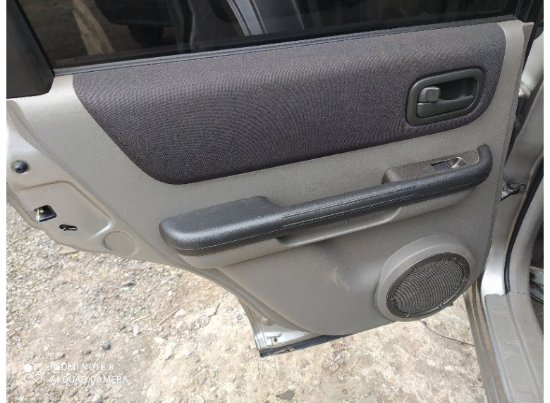 Обшивка двери задней левой (дверная карта) к Nissan X-Trail, 2004г.