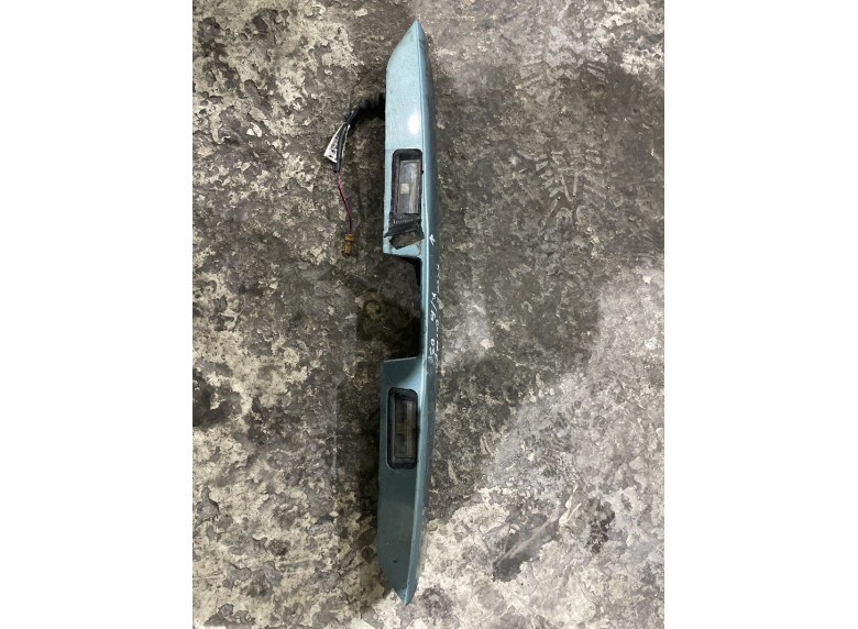 Накладка подсветки номера к Nissan Almera, 2003г.