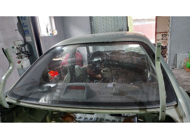 Стекло заднее к Nissan Almera Classic