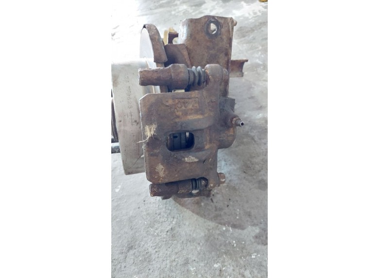 Суппорт задний левый к Mitsubishi Lancer