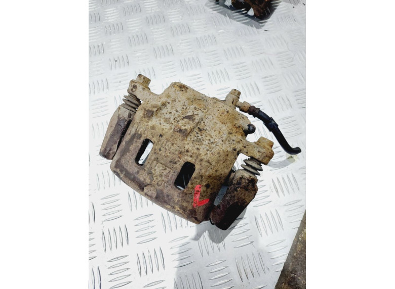 Суппорт передний левый к Mazda Millenia, 1998г.