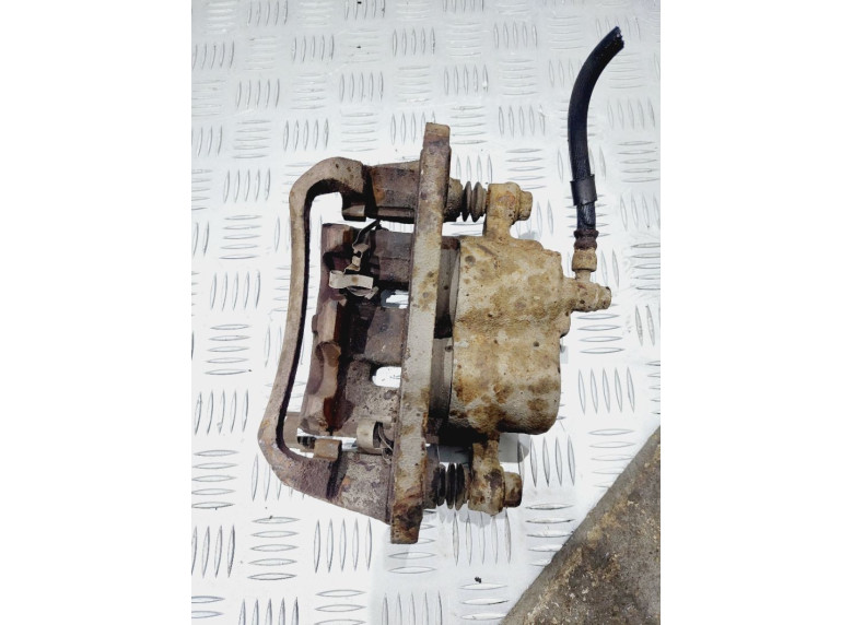 Суппорт передний левый к Mazda Millenia, 1998г.