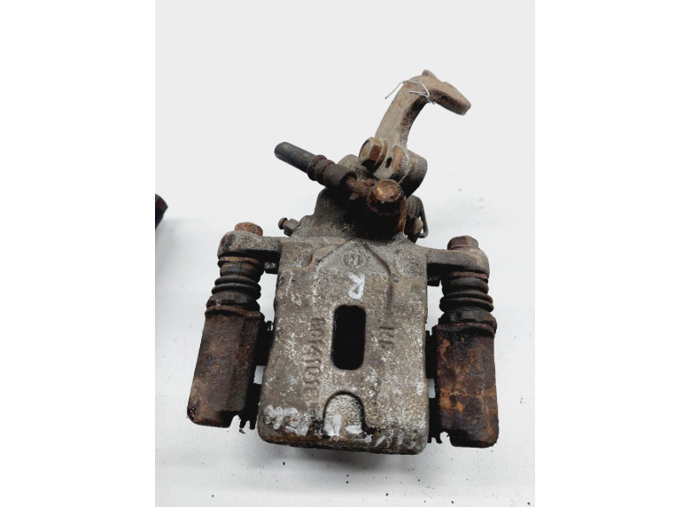 Суппорт задний правый к Mazda Premacy