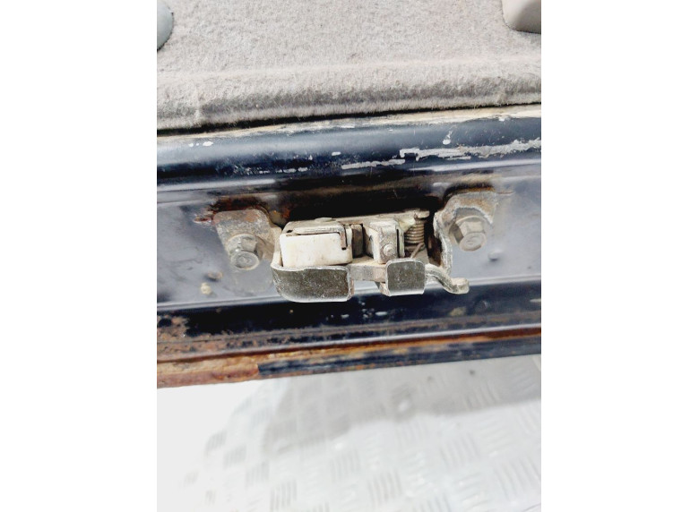 Замок багажника к Mazda Demio