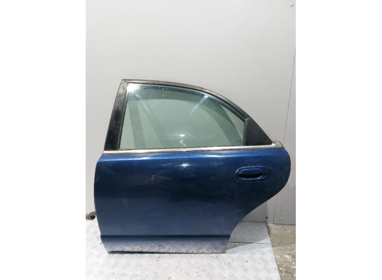 Стекло двери задней левой к Mazda Xedos 9
