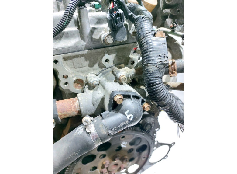 Корпус термостата к Nissan Almera