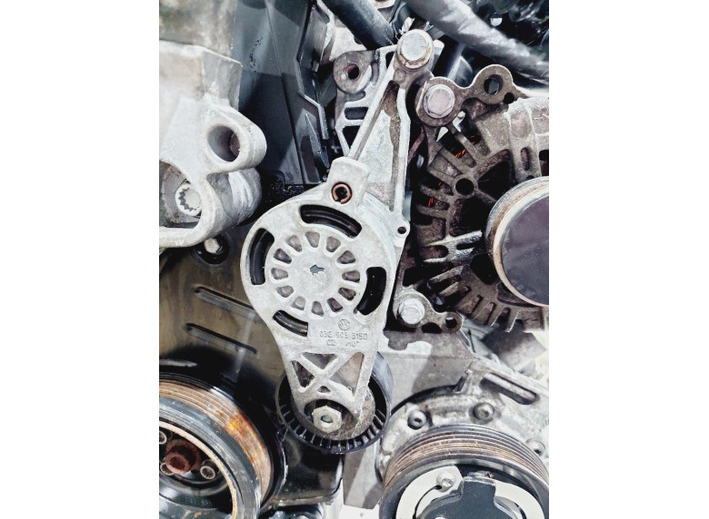 Натяжитель ремня генератора к Seat Leon