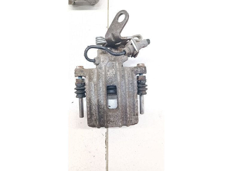 Суппорт задний левый к Skoda Octavia