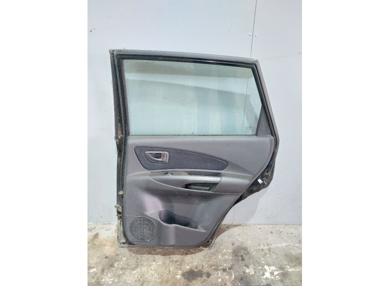 Обшивка двери задней правой (дверная карта) к Hyundai Tucson, 2008г.