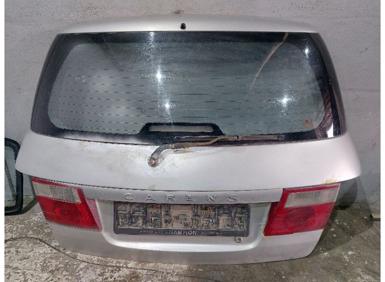 Замок багажника к Kia Carens, 2004г.