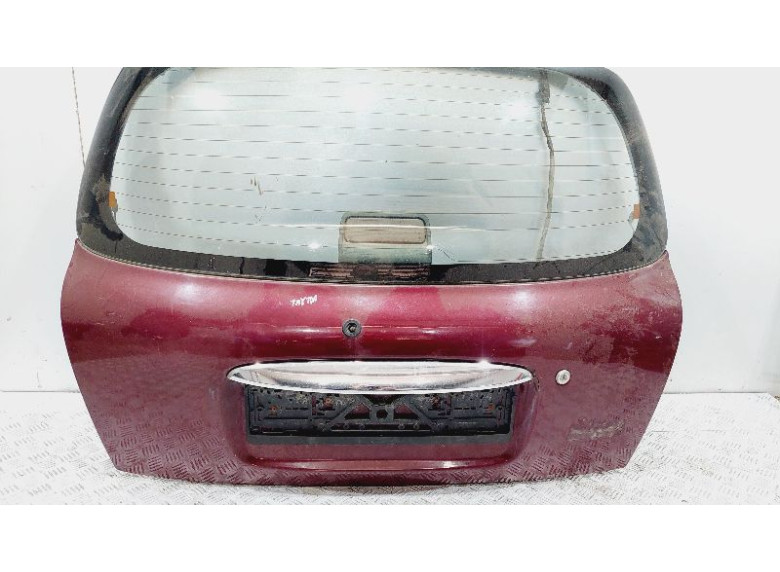 Накладка подсветки номера к Daihatsu Sirion, 2000г.