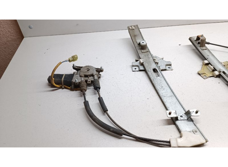 Стеклоподъемник электрический передний левый к Kia Clarus, 1997г.