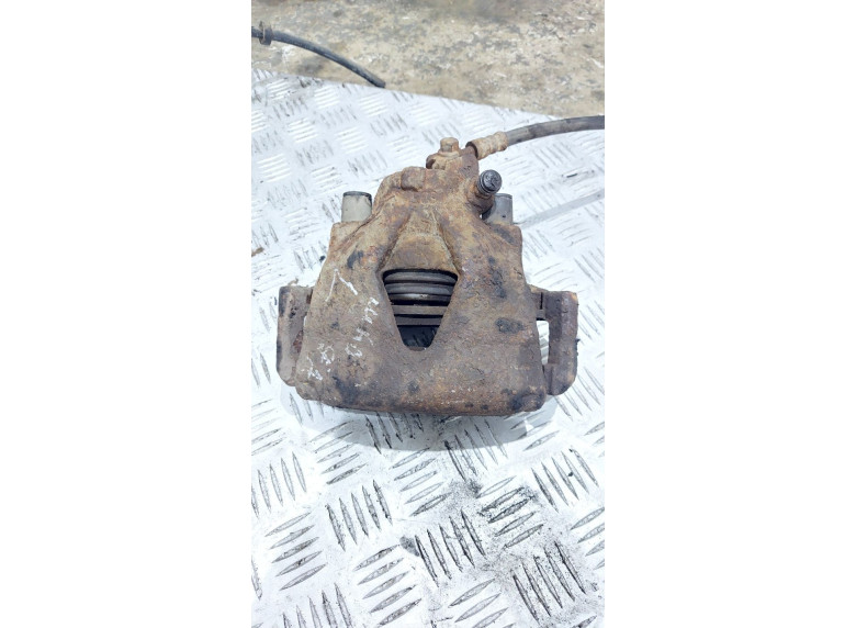 Суппорт передний левый к Skoda Octavia