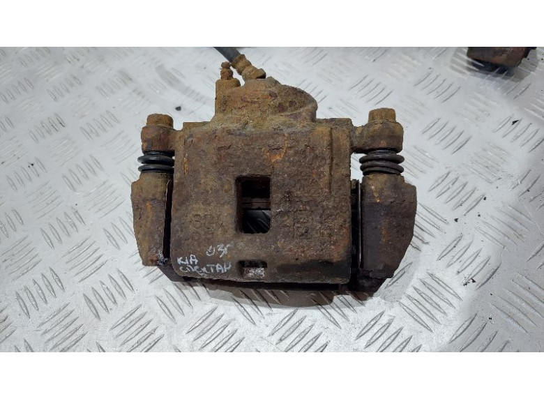 Суппорт передний правый к Kia Spectra, 2003г.