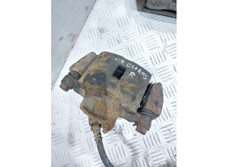 Суппорт передний правый к Kia Clarus, 1999г.