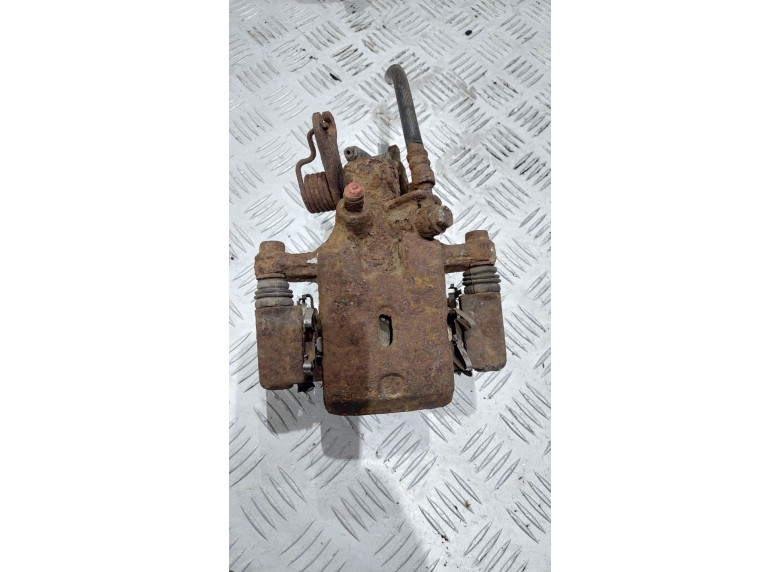 Суппорт задний левый к Nissan Maxima