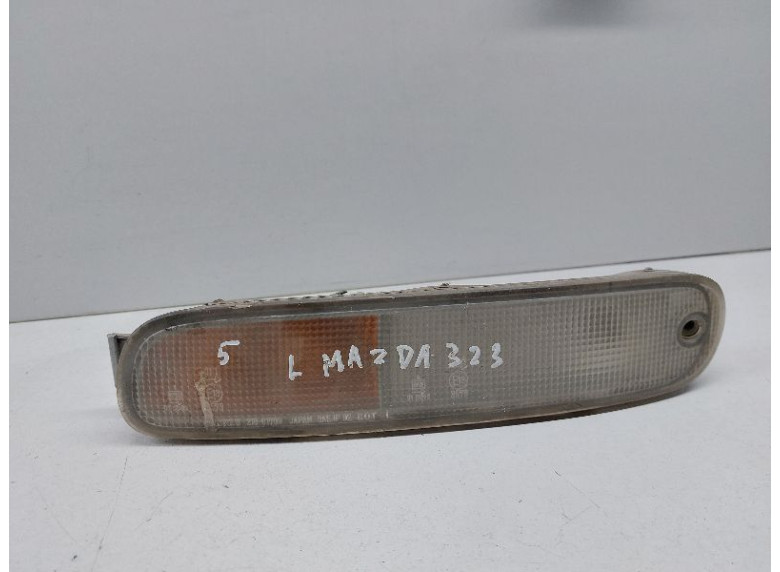Поворотник левый к Mazda 323, 1995г.