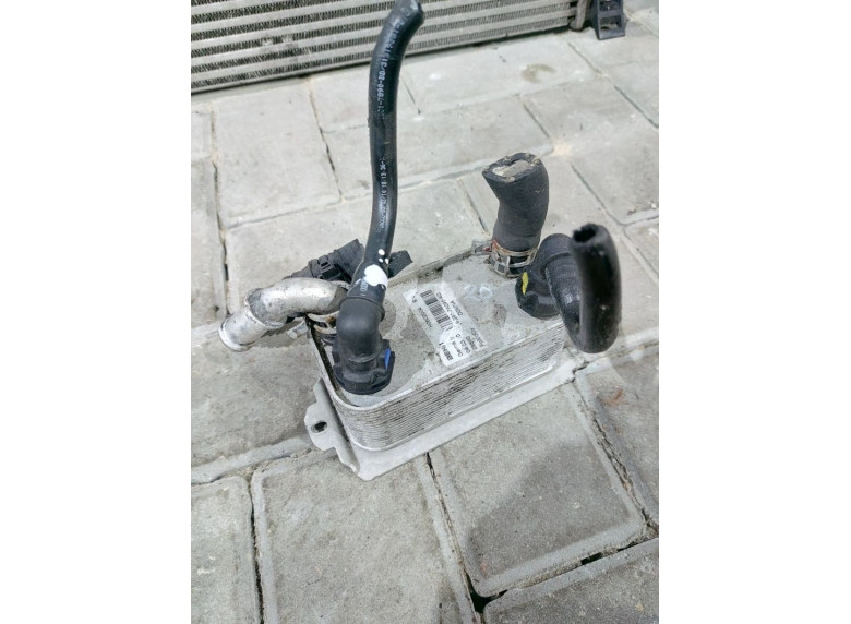 Теплообменник масляного фильтра к Volvo S80