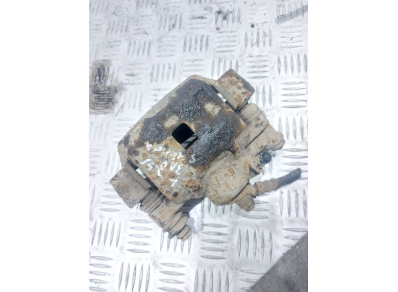 Суппорт задний левый к Subaru Outback