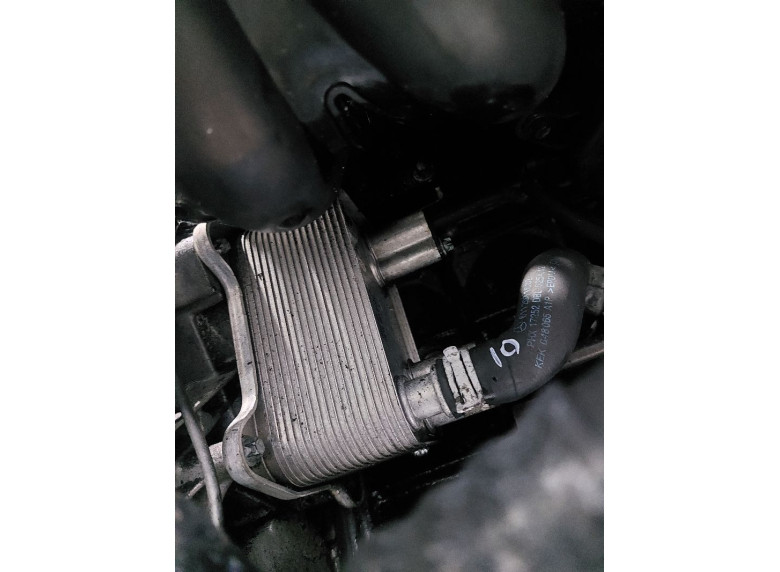 Теплообменник масляного фильтра к Mercedes C W203, 2002г.