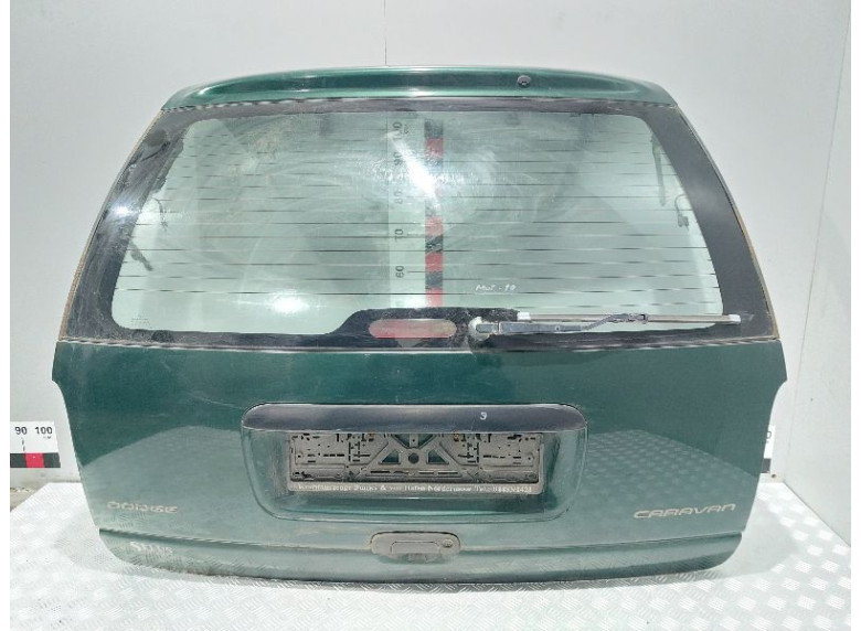 Накладка подсветки номера к Chrysler Voyager, 1998г.