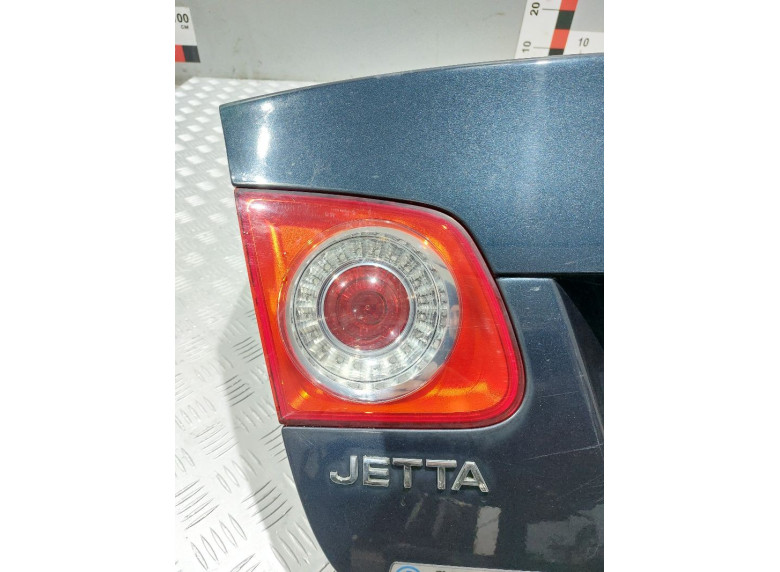 Фонарь крышки багажника левый к Volkswagen Jetta, 2009г.