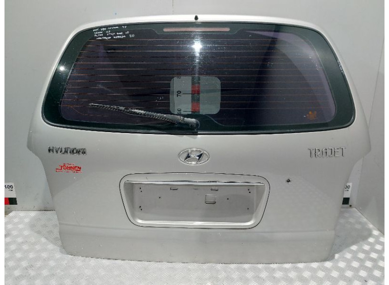 Накладка подсветки номера к Hyundai Trajet, 2004г.