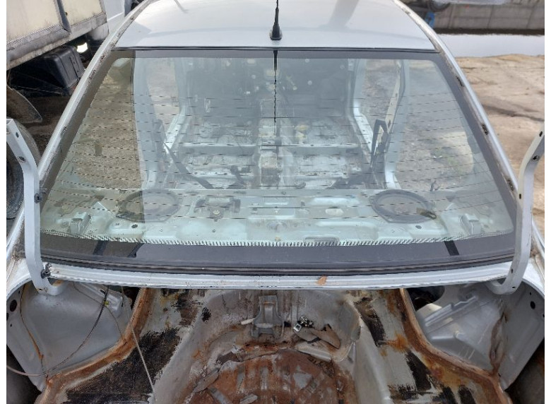 Стекло заднее к Mitsubishi Lancer, 2005г.