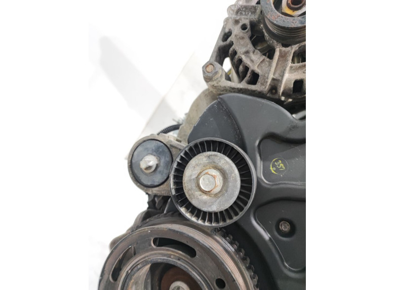 Натяжитель ремня генератора к Opel Astra, 2000г.