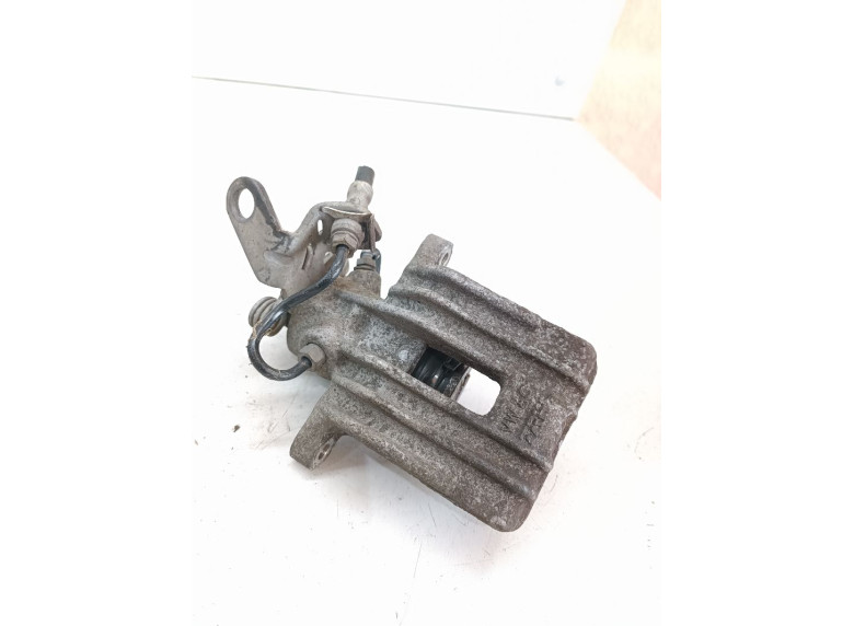 Суппорт задний левый к Volkswagen Golf, 2006г.