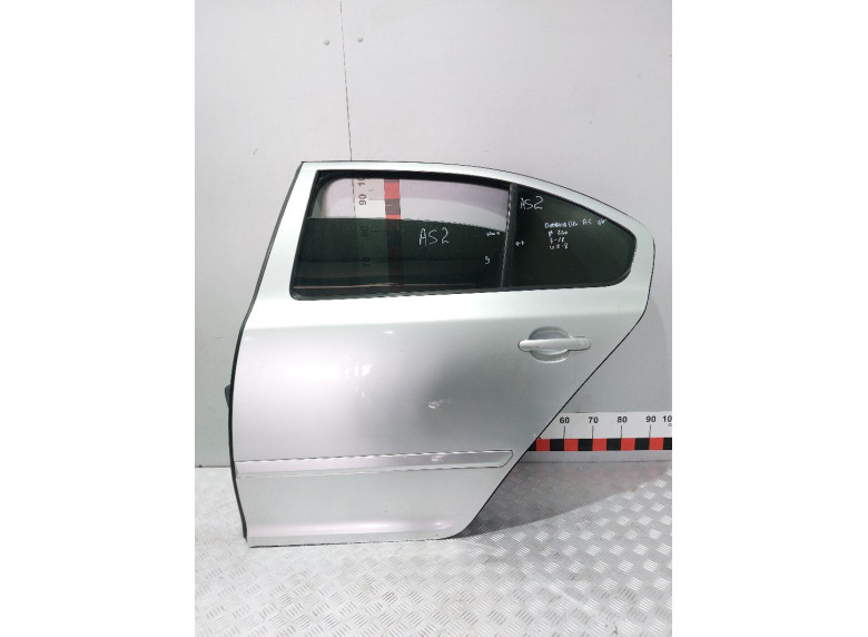 Замок двери задней левой к Skoda Octavia