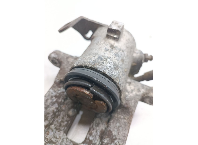 Суппорт задний левый к Volkswagen Golf, 1998г.