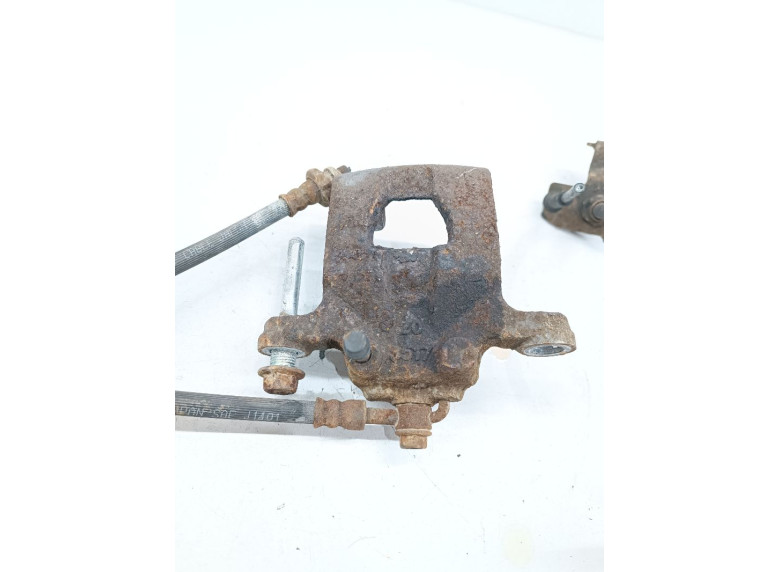 Суппорт задний левый к Nissan Teana