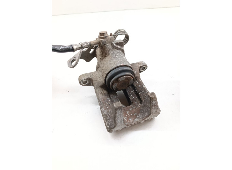 Суппорт задний правый к Volkswagen Passat, 2003г.