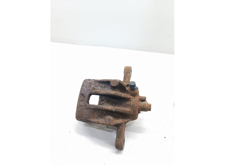 Суппорт задний левый к Kia Soul