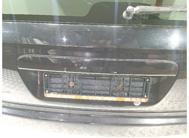 Накладка подсветки номера к Chrysler Voyager, 2004г.