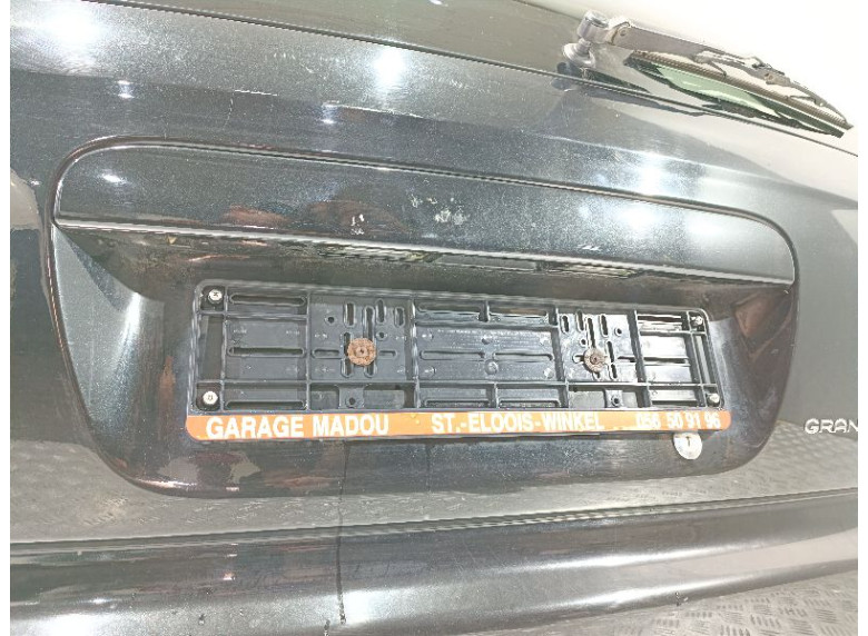 Накладка подсветки номера к Chrysler Voyager, 2004г.
