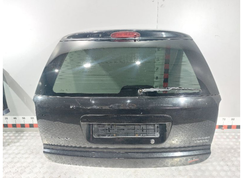 Накладка подсветки номера к Chrysler Grand Voyager, 2002г.