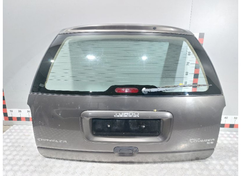 Накладка подсветки номера к Chrysler Grand Voyager, 1998г.