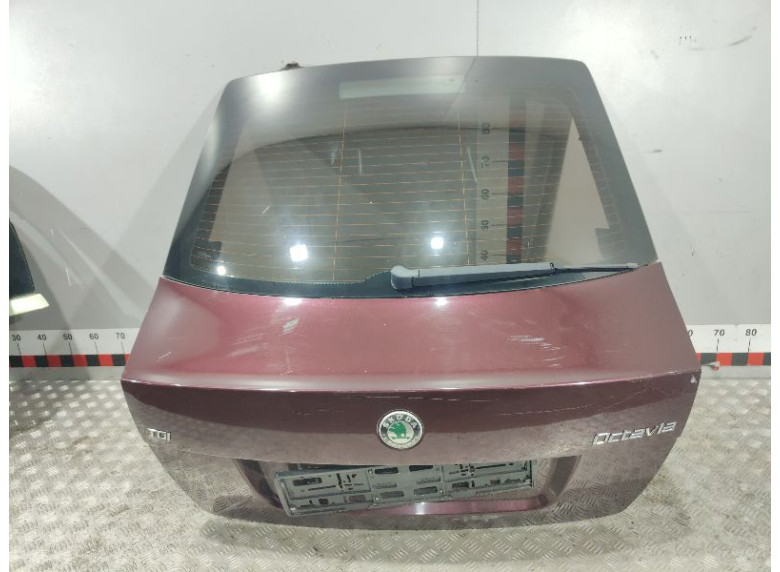 Замок багажника к Skoda Octavia