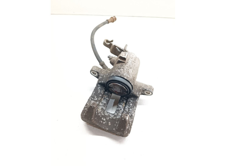 Суппорт задний левый к Volkswagen Golf, 2006г.