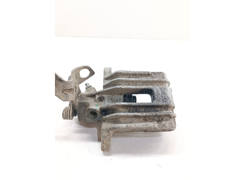 Суппорт задний левый к Volkswagen Golf, 2006г.