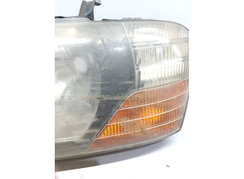 Фара левая к Mitsubishi Pajero, 2003г.