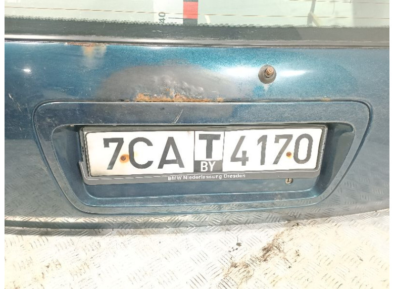 Накладка подсветки номера к Suzuki Baleno, 2000г.
