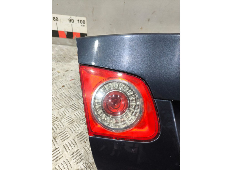 Фонарь крышки багажника левый к Volkswagen Jetta, 2006г.