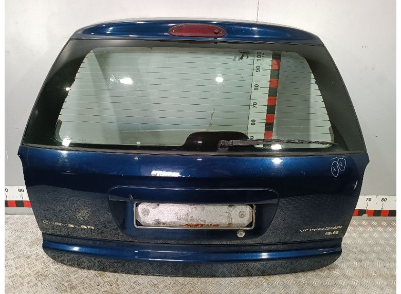 Накладка подсветки номера к Chrysler Voyager, 2002г.