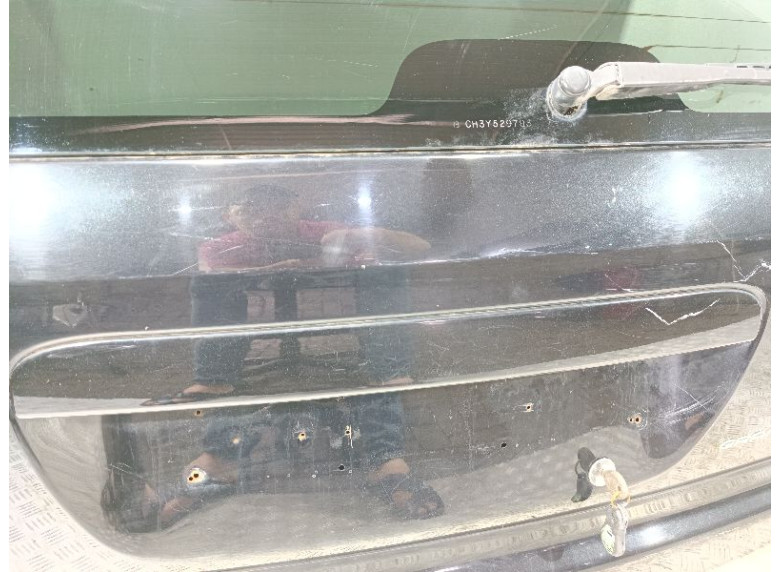 Накладка подсветки номера к Chrysler Voyager, 2002г.