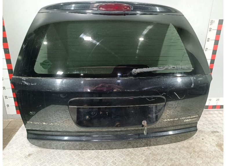 Накладка подсветки номера к Chrysler Voyager, 2002г.