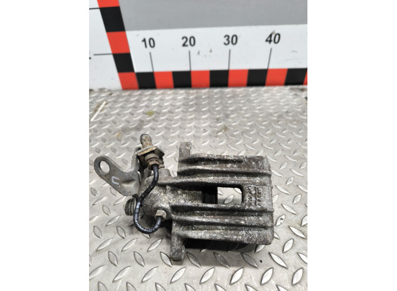 Суппорт задний левый к Volkswagen Golf, 2006г.