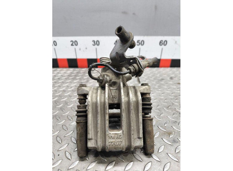 Суппорт задний левый к Volkswagen Golf, 2006г.